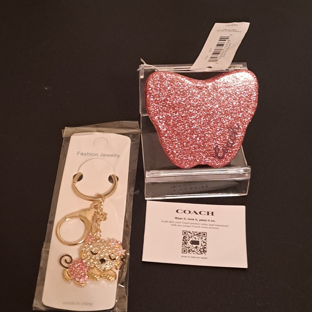 Coach Glittter compact mirror with a cute cat bag charm